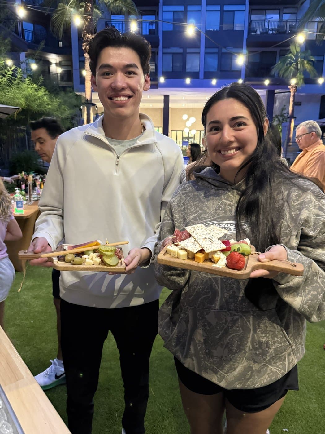 Happy guests showing off the boards I made just the way they like
